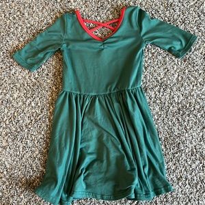 green dress twirl with cross back